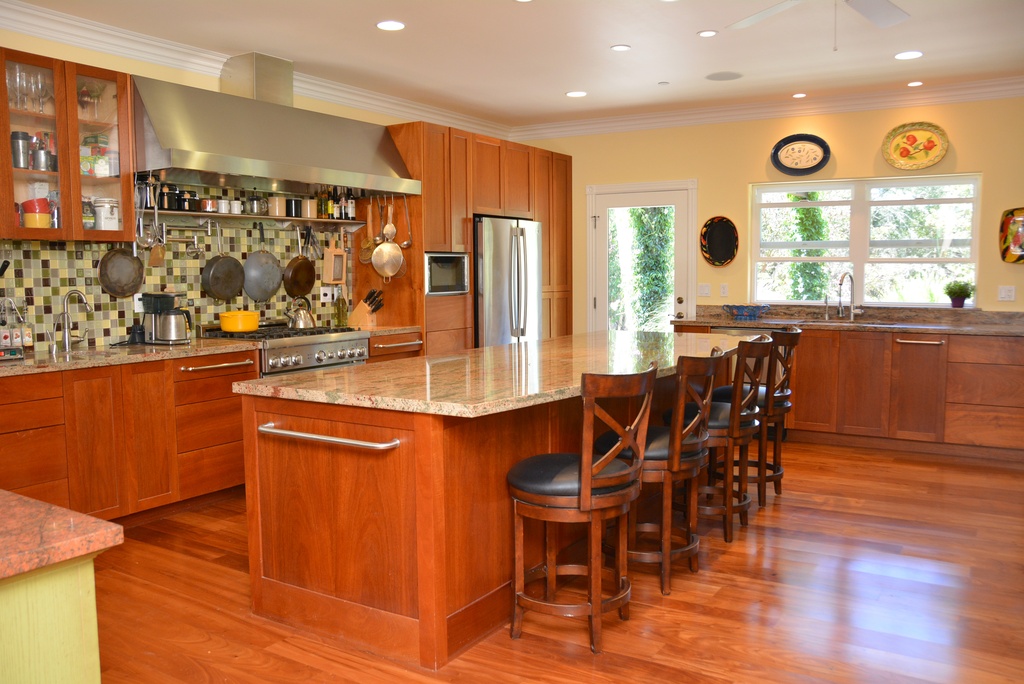 custom kitchen for a mendocino home plan the open plan has a custom kitchen design by the client
